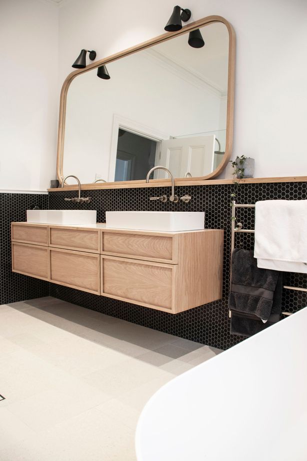 Black honeycombed shapped tiles line the walls | Photos by Jennifer Turner