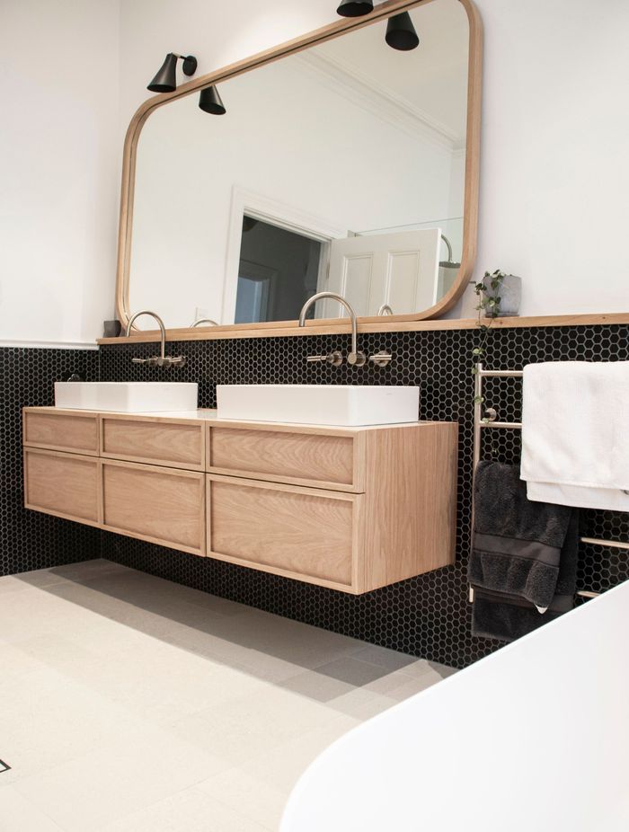 Black honeycombed shapped tiles line the walls | Photos by Jennifer Turner