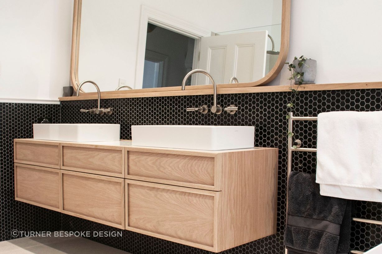 Black honeycombed shapped tiles line the walls | Photos by Jennifer Turner