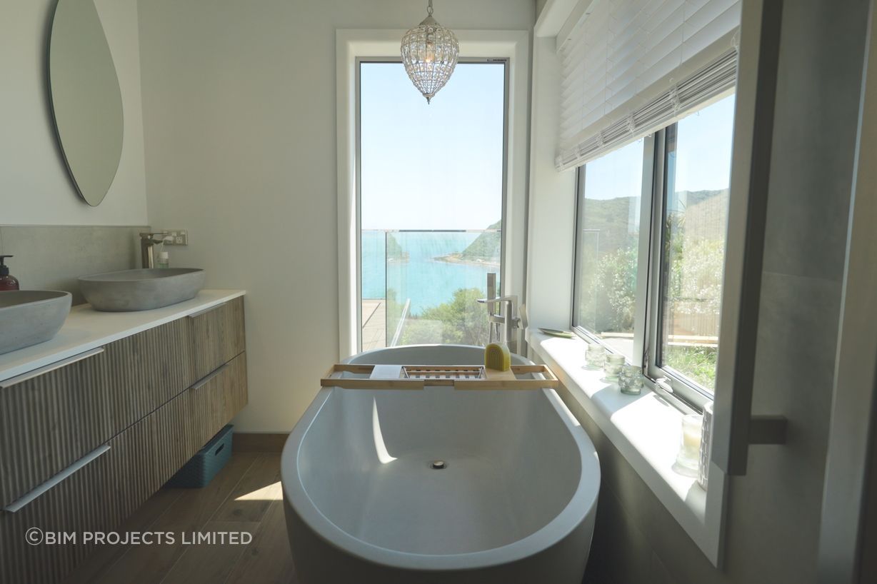 The en suite bathroom featuring the stunning concrete bath.