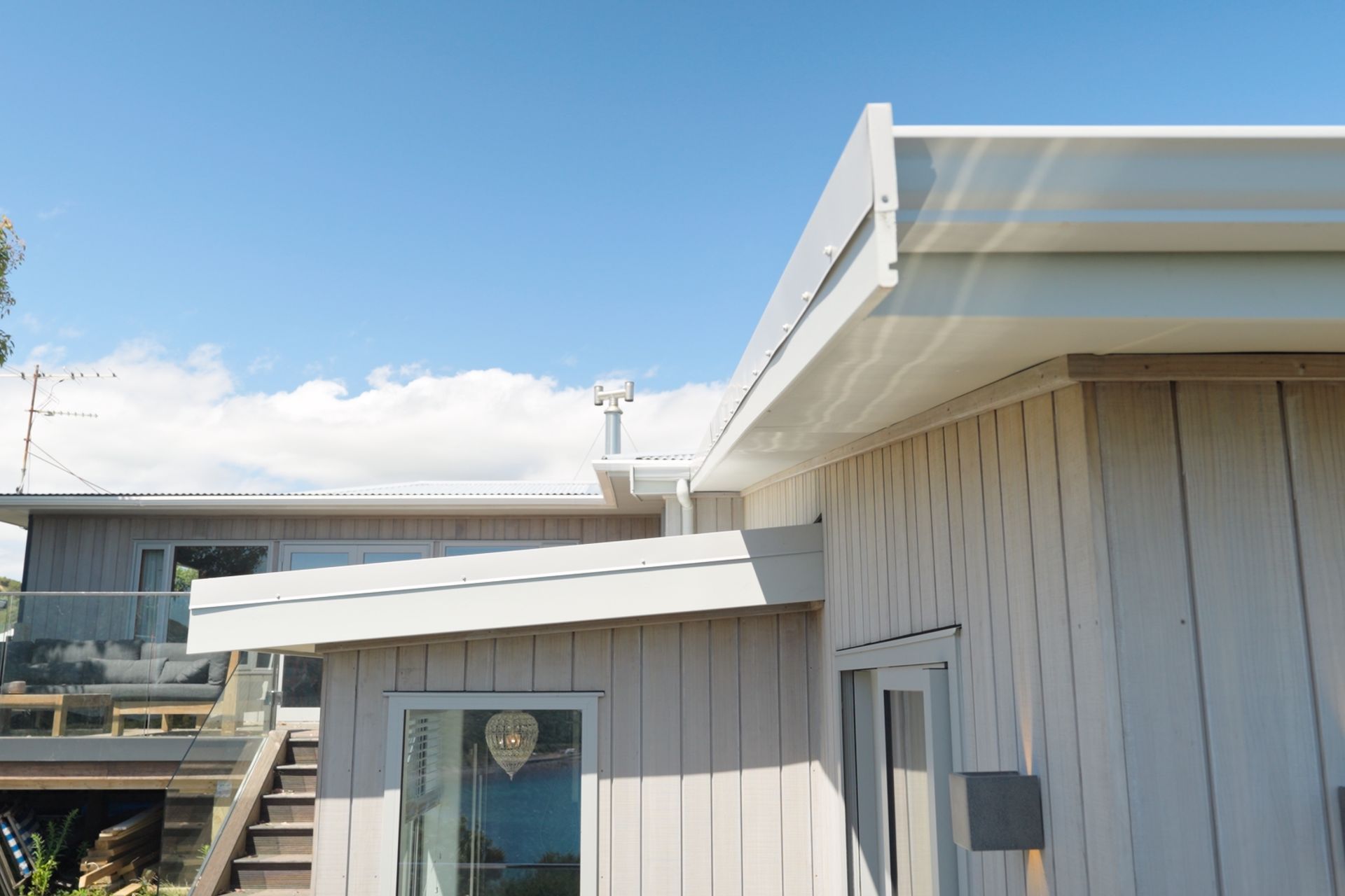 The lower level of the house contains the new extension, while the upper level is the existing home which now connects to a beautiful outdoor entertaining space.