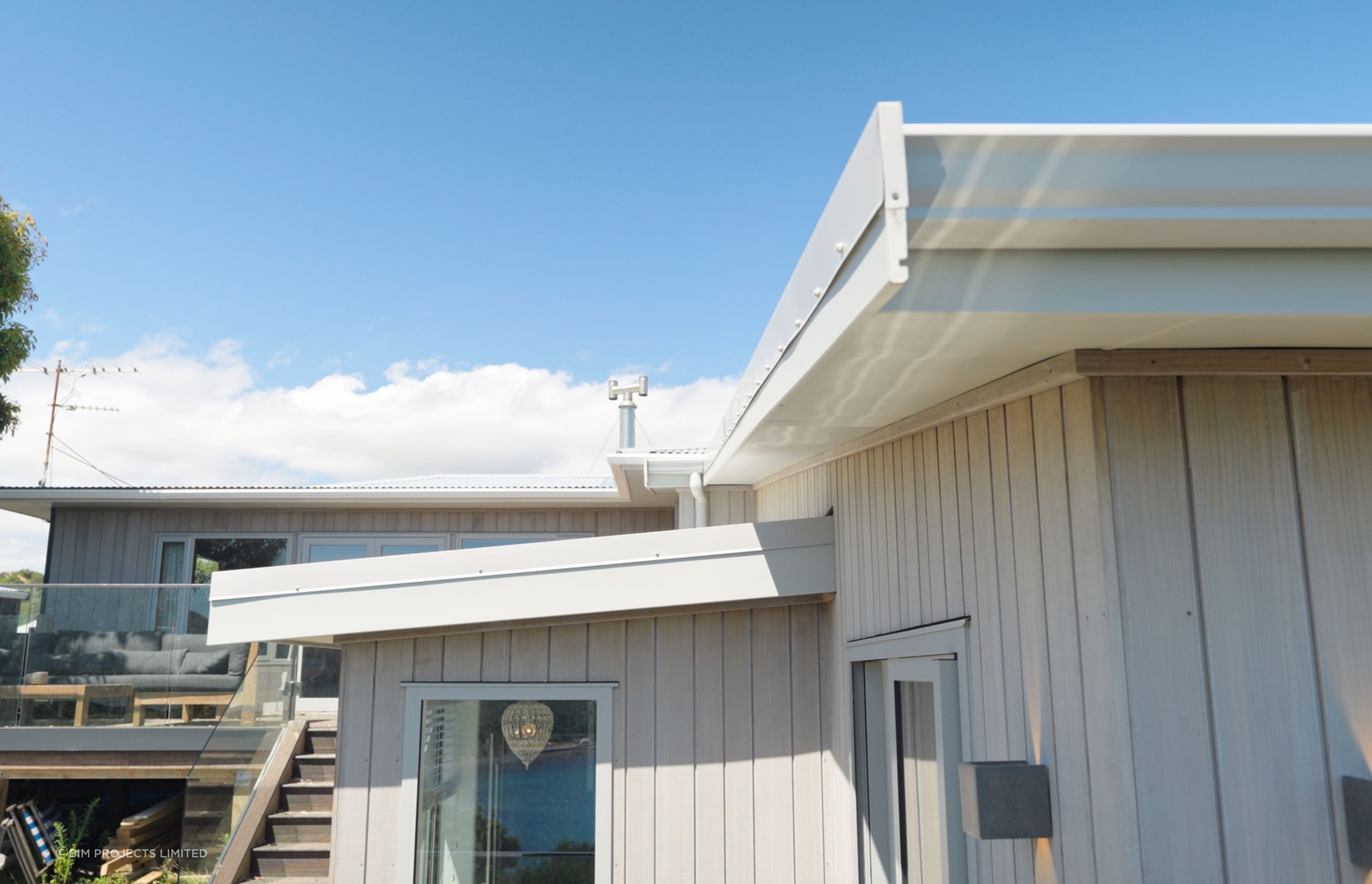 The lower level of the house contains the new extension, while the upper level is the existing home which now connects to a beautiful outdoor entertaining space.