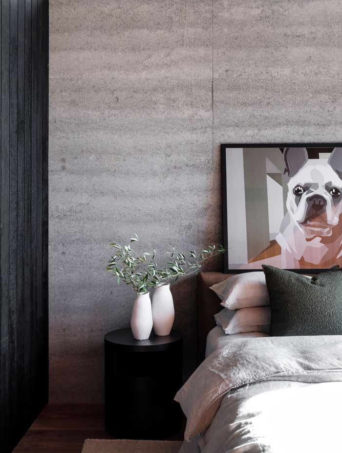 Rammed earth creates a solid feel to the interior.