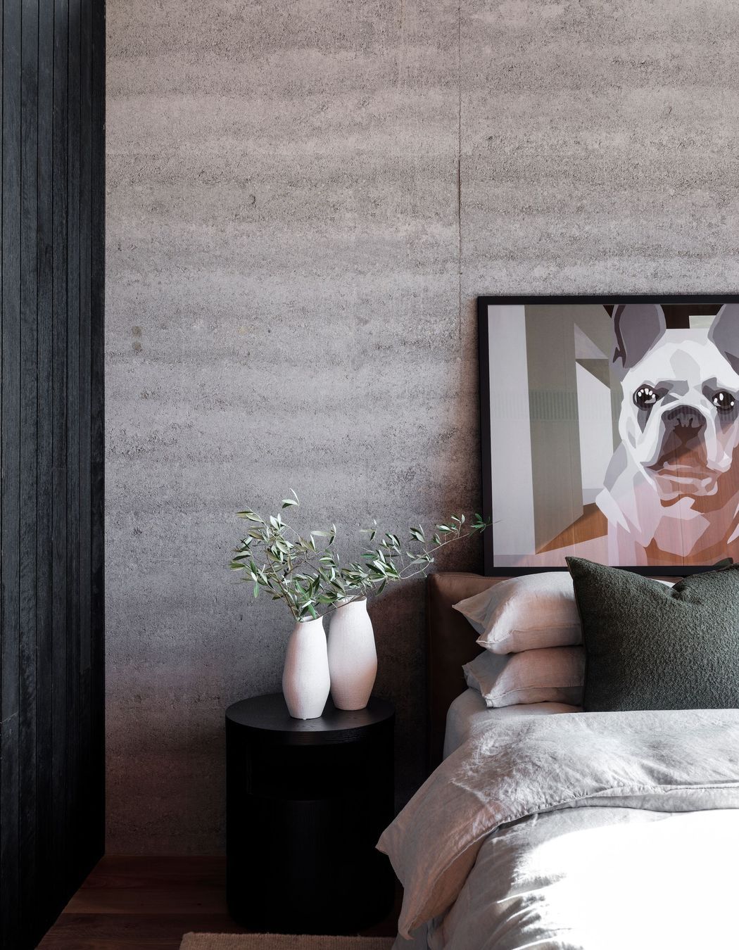 Rammed earth creates a solid feel to the interior.