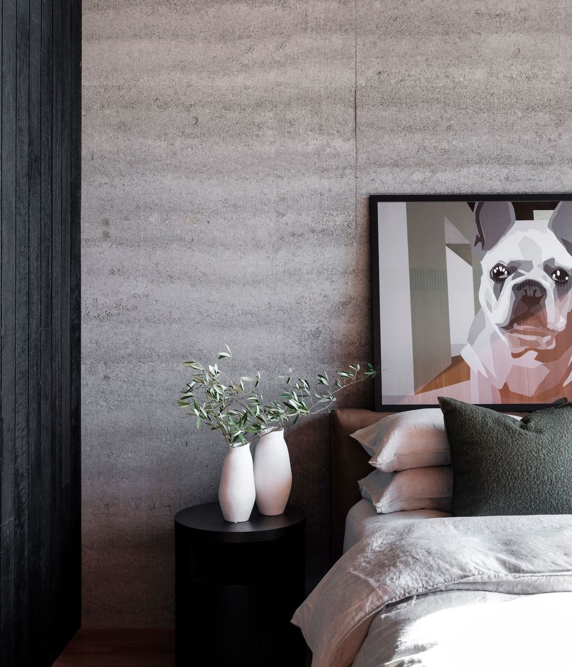 Rammed earth creates a solid feel to the interior.