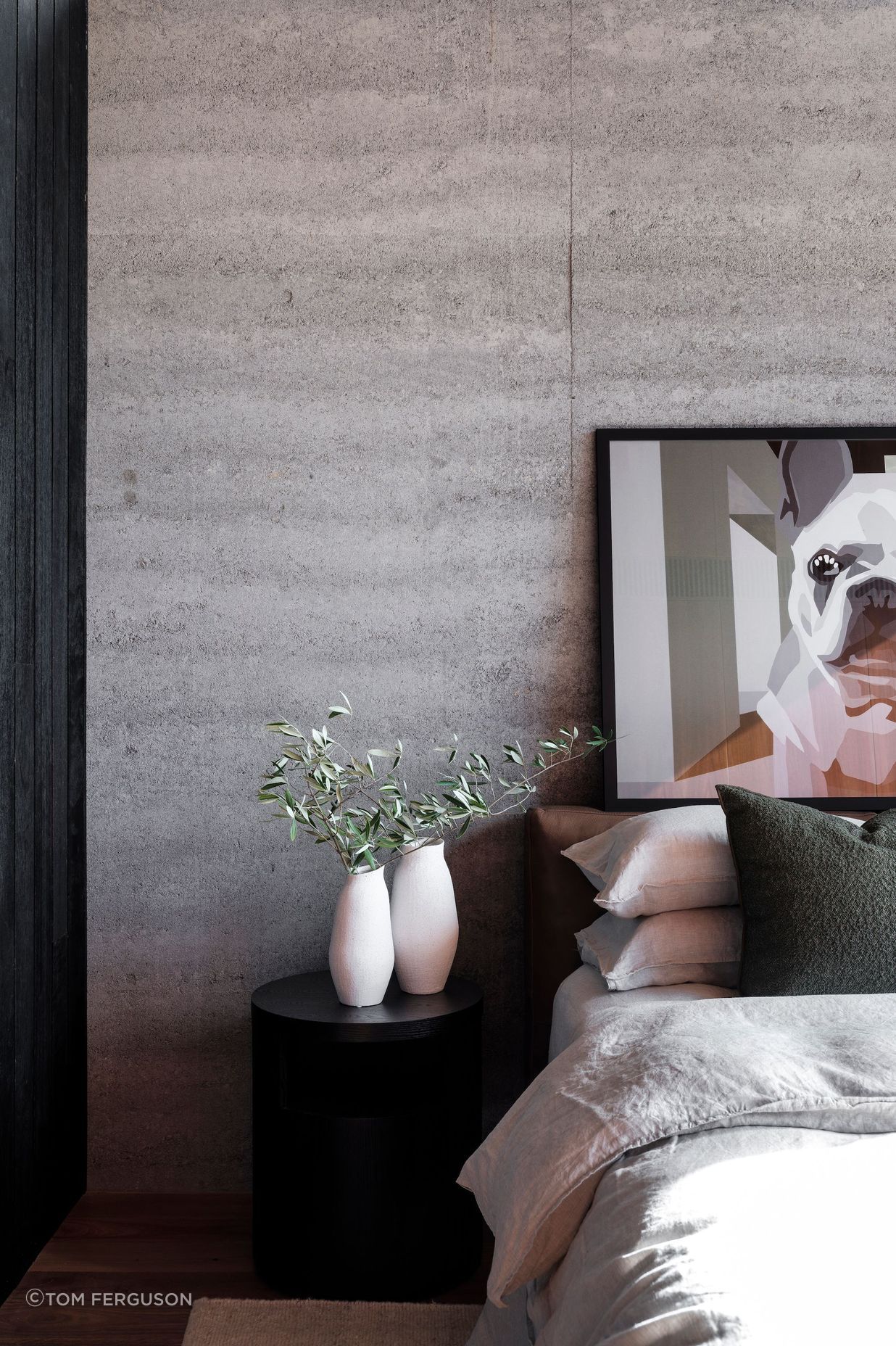 Rammed earth creates a solid feel to the interior.