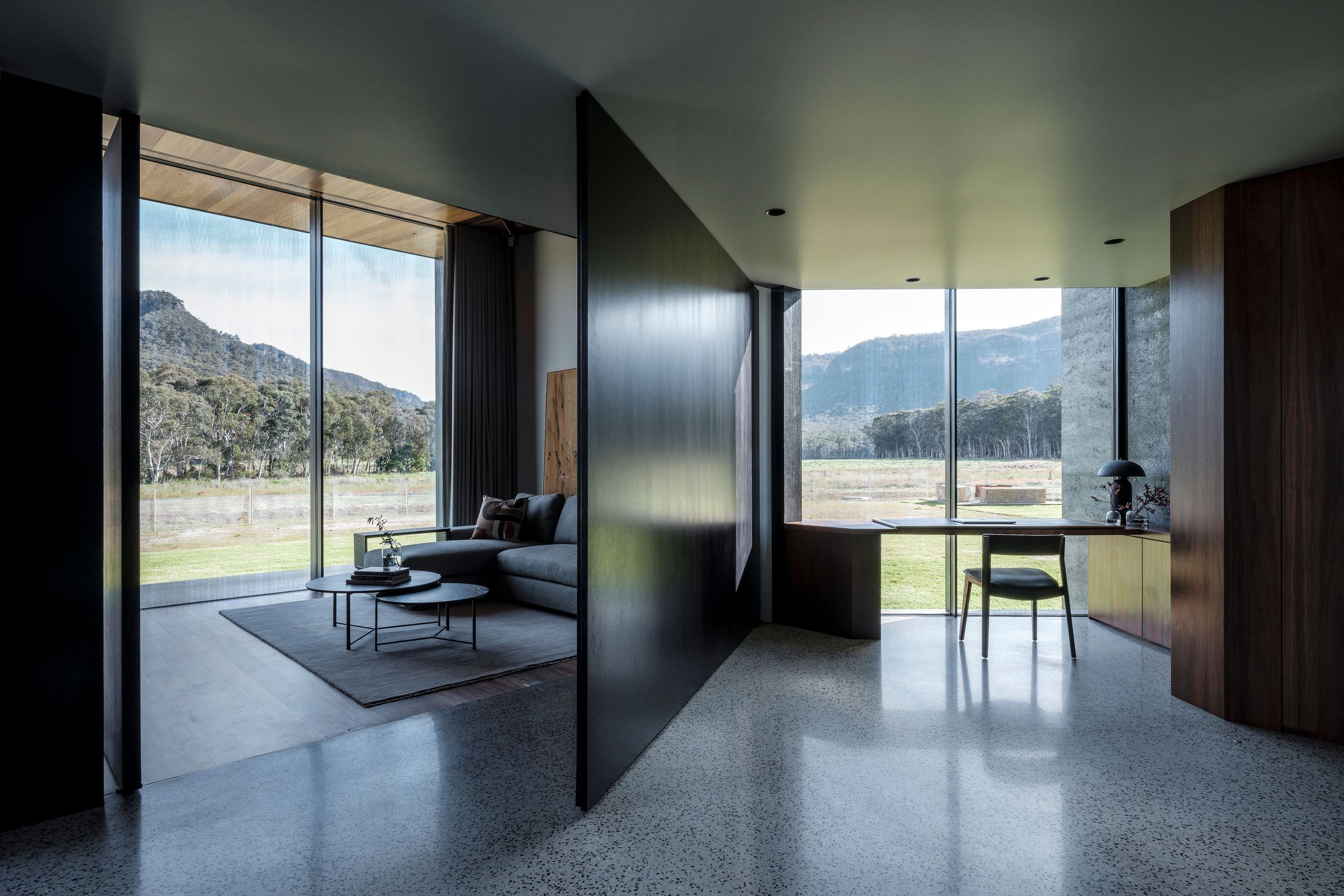 The home office boasts a large pivoting four-metre black wall; transforming the room into a lounge area, a private study or an additional bedroom.
