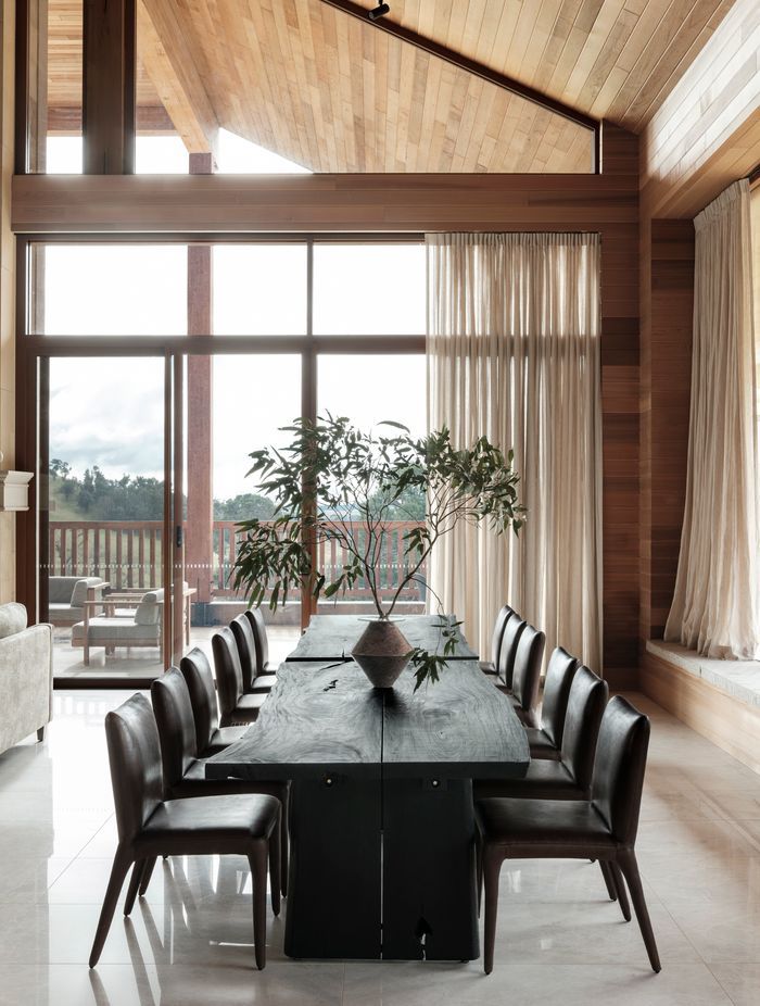 Across two dining tables, up to 14 people can gather for meals.