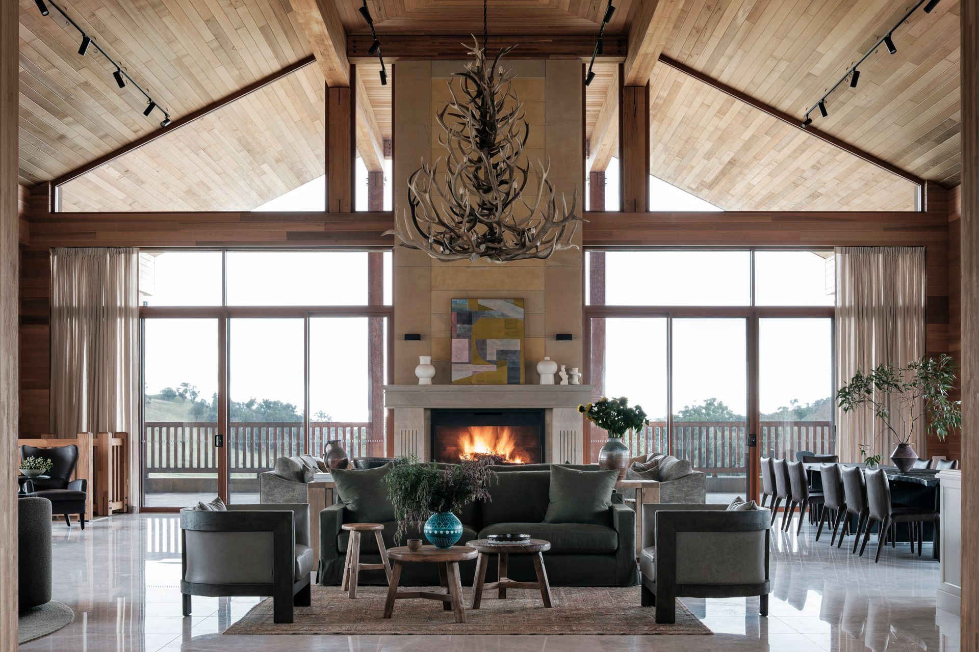 Furniture curation and the zoning of various cosy conversation pits and break-out areas were central to creating a sense of intimacy in the 12 metre-wide open living/dining space.