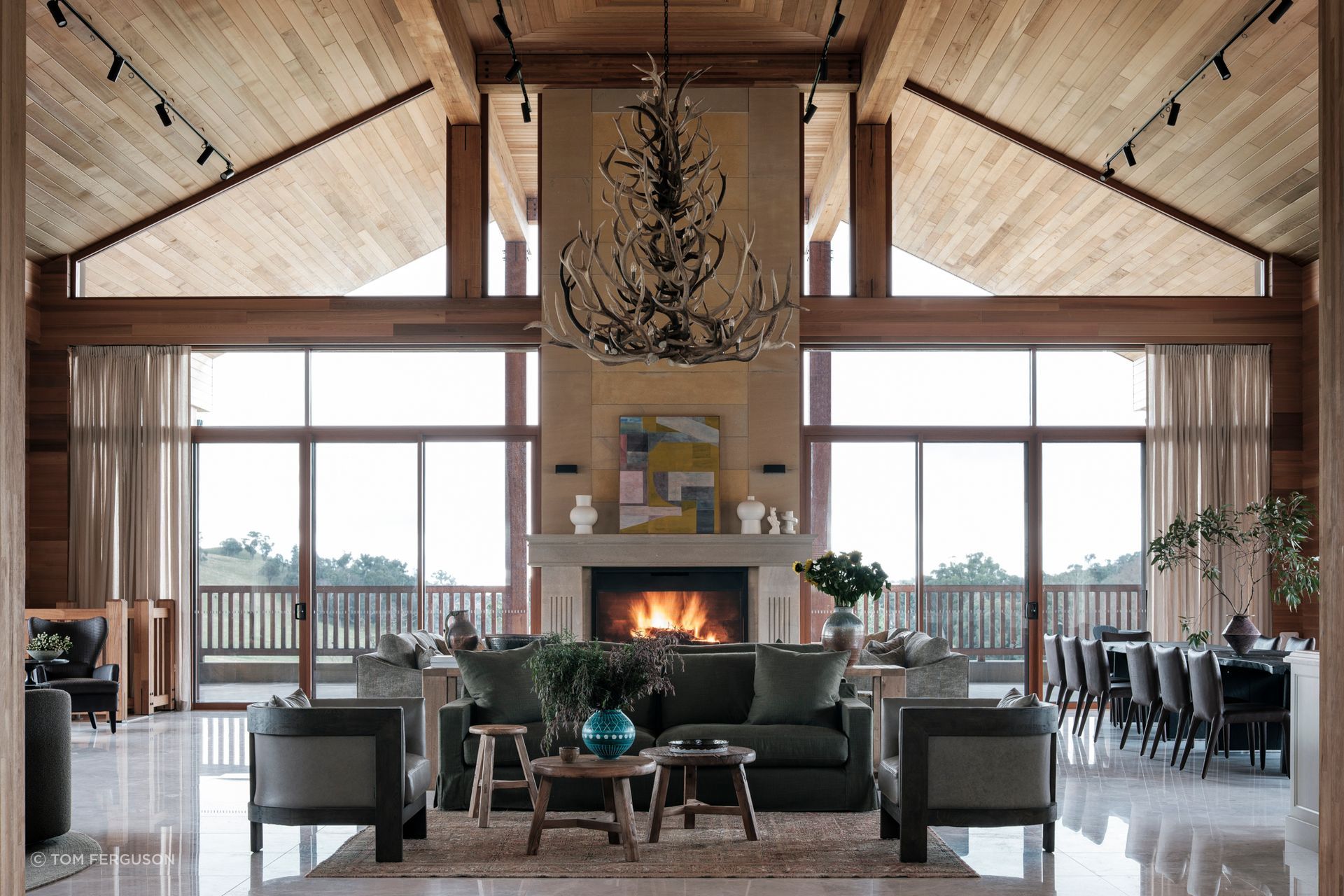 Furniture curation and the zoning of various cosy conversation pits and break-out areas were central to creating a sense of intimacy in the 12 metre-wide open living/dining space.