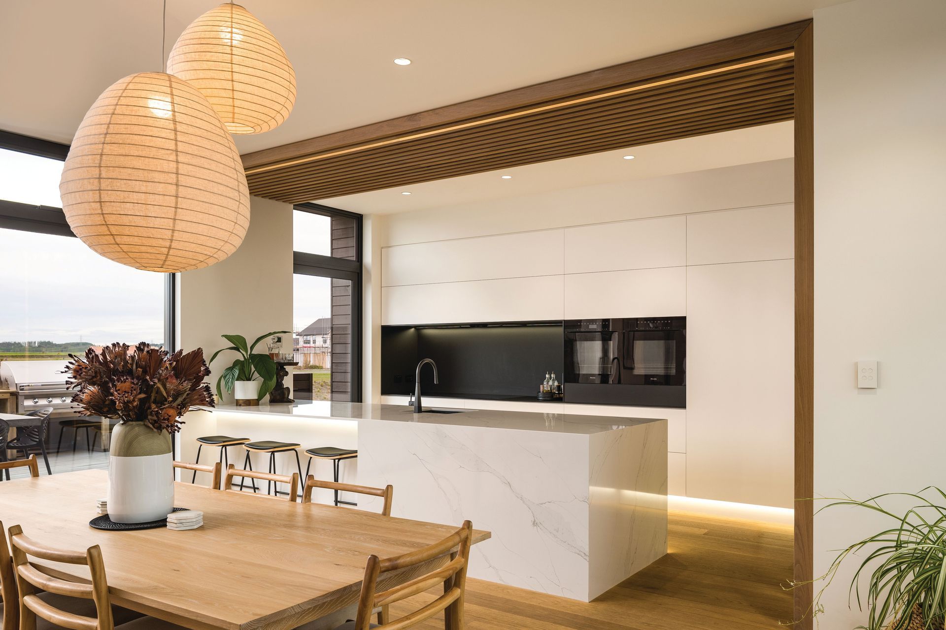 The living area is open and spacious, orientated north to capture the views and the sun.