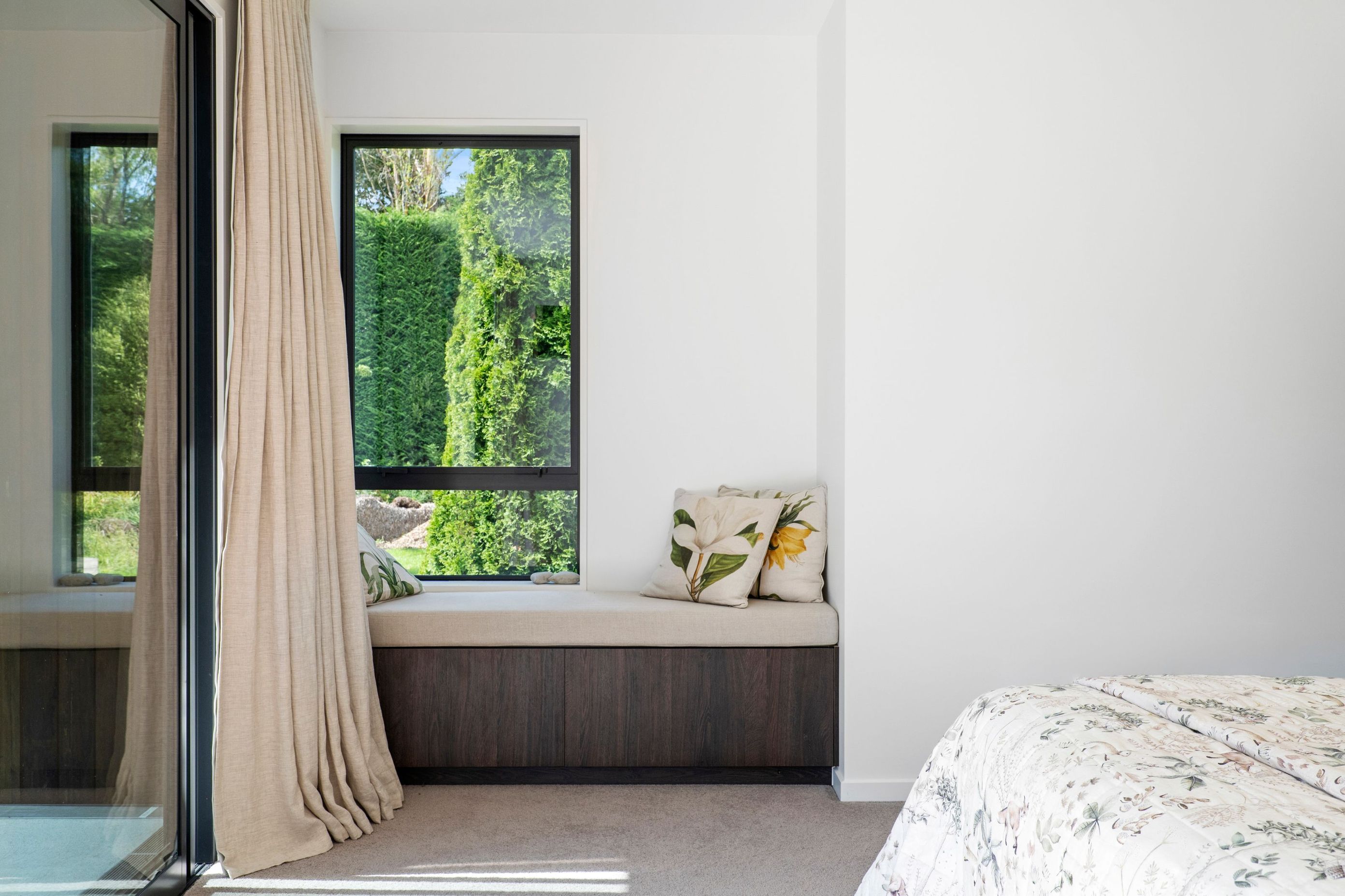 Complete with a built-in window seat, the master suite is a retreat from the rest of the home.