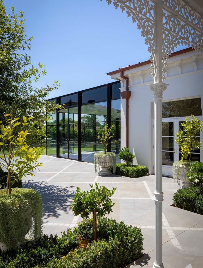 Ornate detailing remains as a contrast to the modern extension.