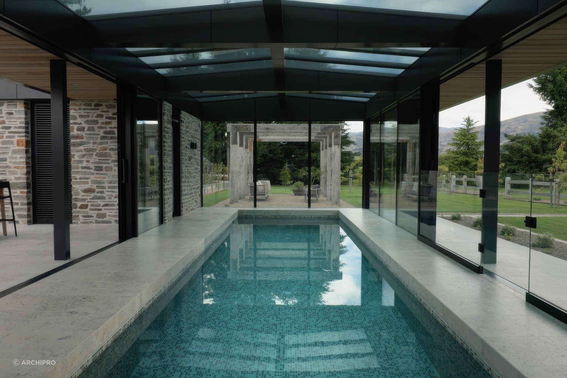 The indoor pool is glazed on each side and features a triple glazed roof.