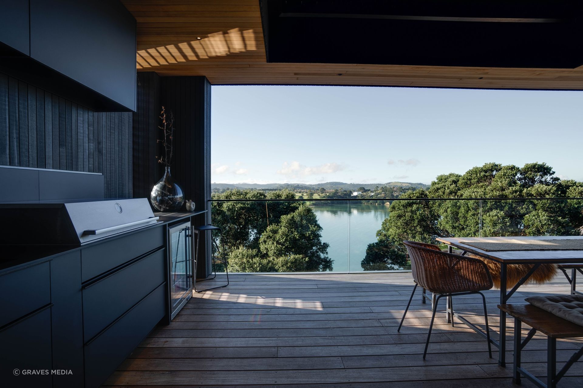 Pōhutukawa frame the view from the northeasterly deck.