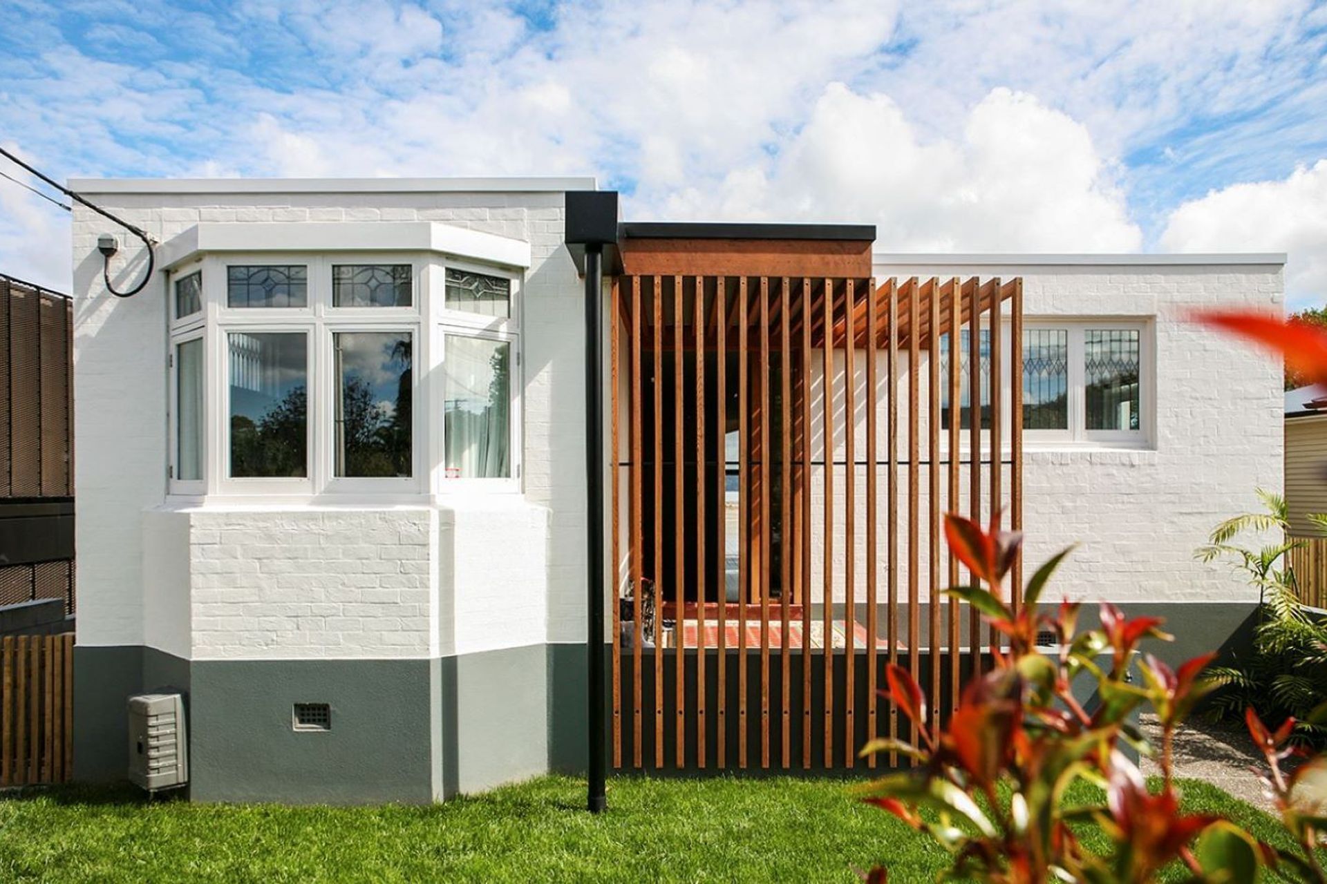 The humble brick exterior of this Winsomere Crescent home belies what awaits inside — Photography: Emma-Jane Hetherington