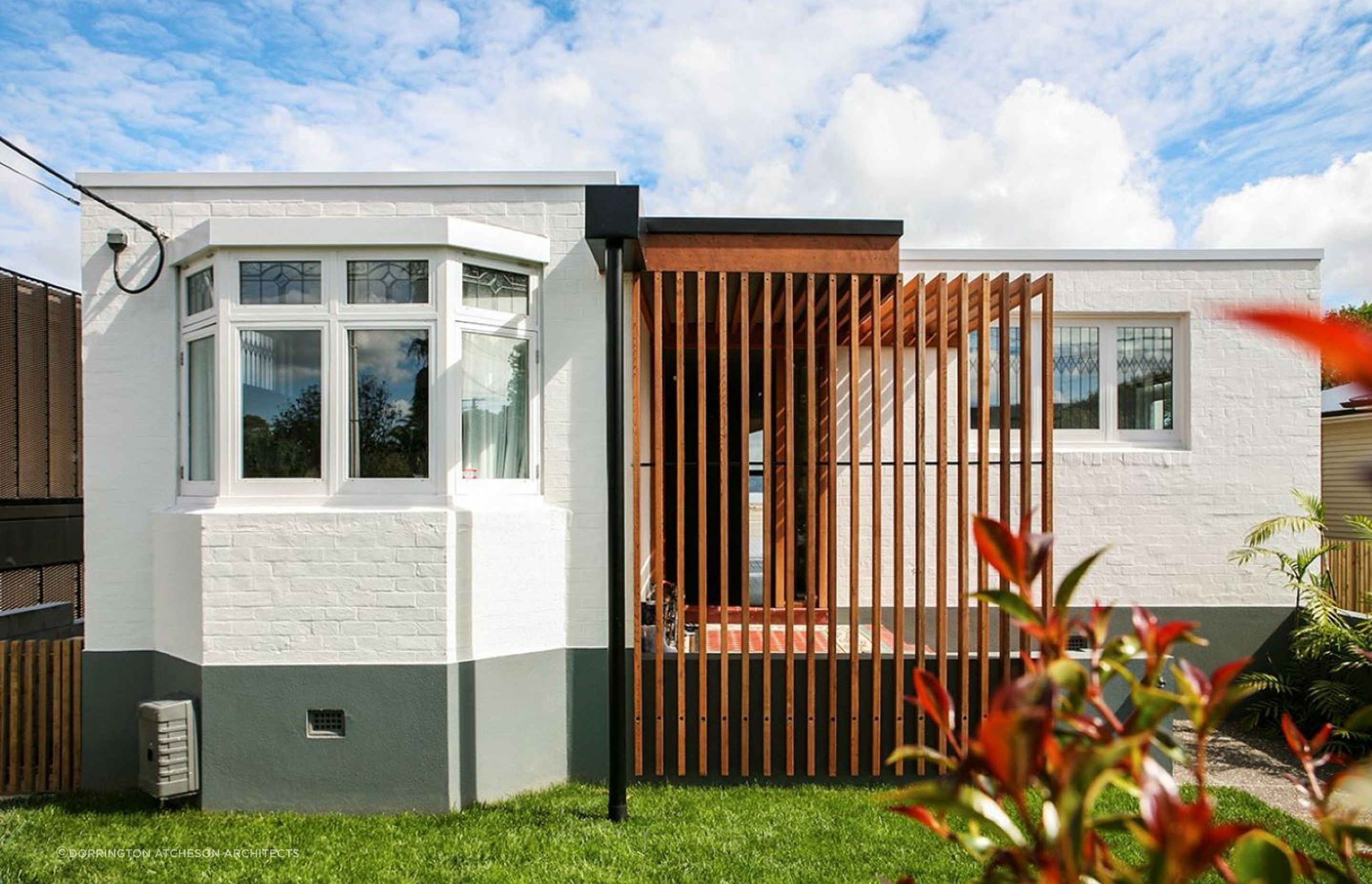 The humble brick exterior of this Winsomere Crescent home belies what awaits inside — Photography: Emma-Jane Hetherington
