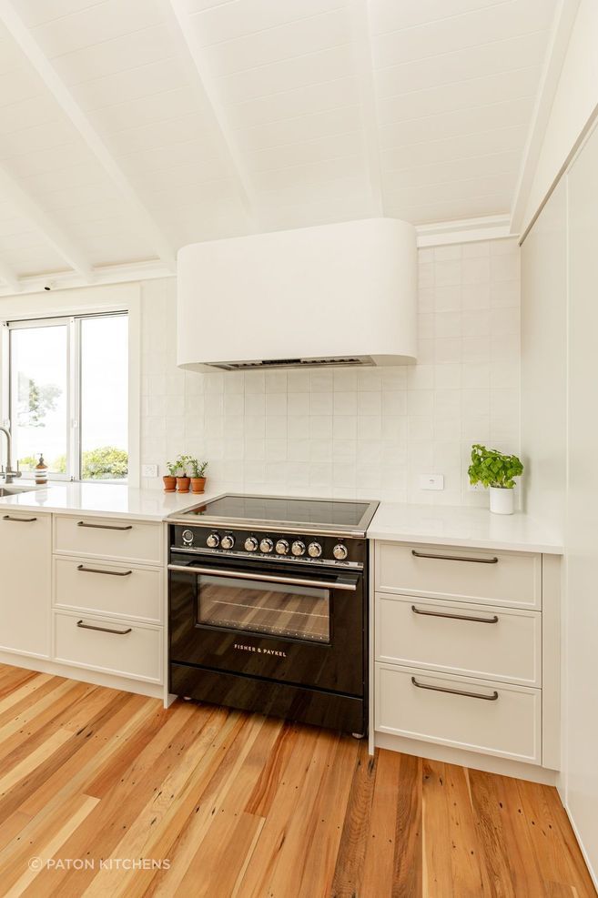 “Functionality is paramount in this bespoke kitchen - integrated Fisher &amp; Paykel appliances ensure that every culinary need is met with ease, while the sleek, modern lines of the appliances complement the kitchen’s overall aesthetic.”