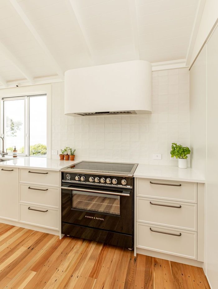 “Functionality is paramount in this bespoke kitchen - integrated Fisher & Paykel appliances ensure that every culinary need is met with ease, while the sleek, modern lines of the appliances complement the kitchen’s overall aesthetic.”