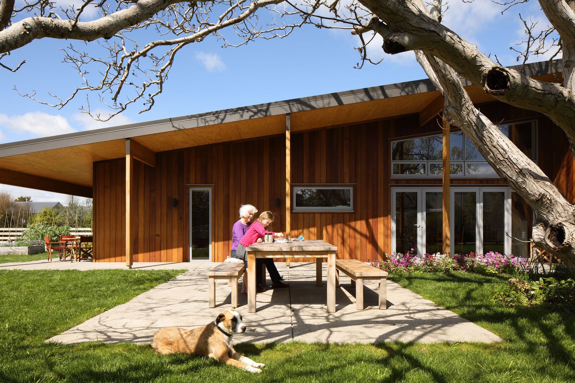 Timber cladding complements the home's beautiful surroundings.