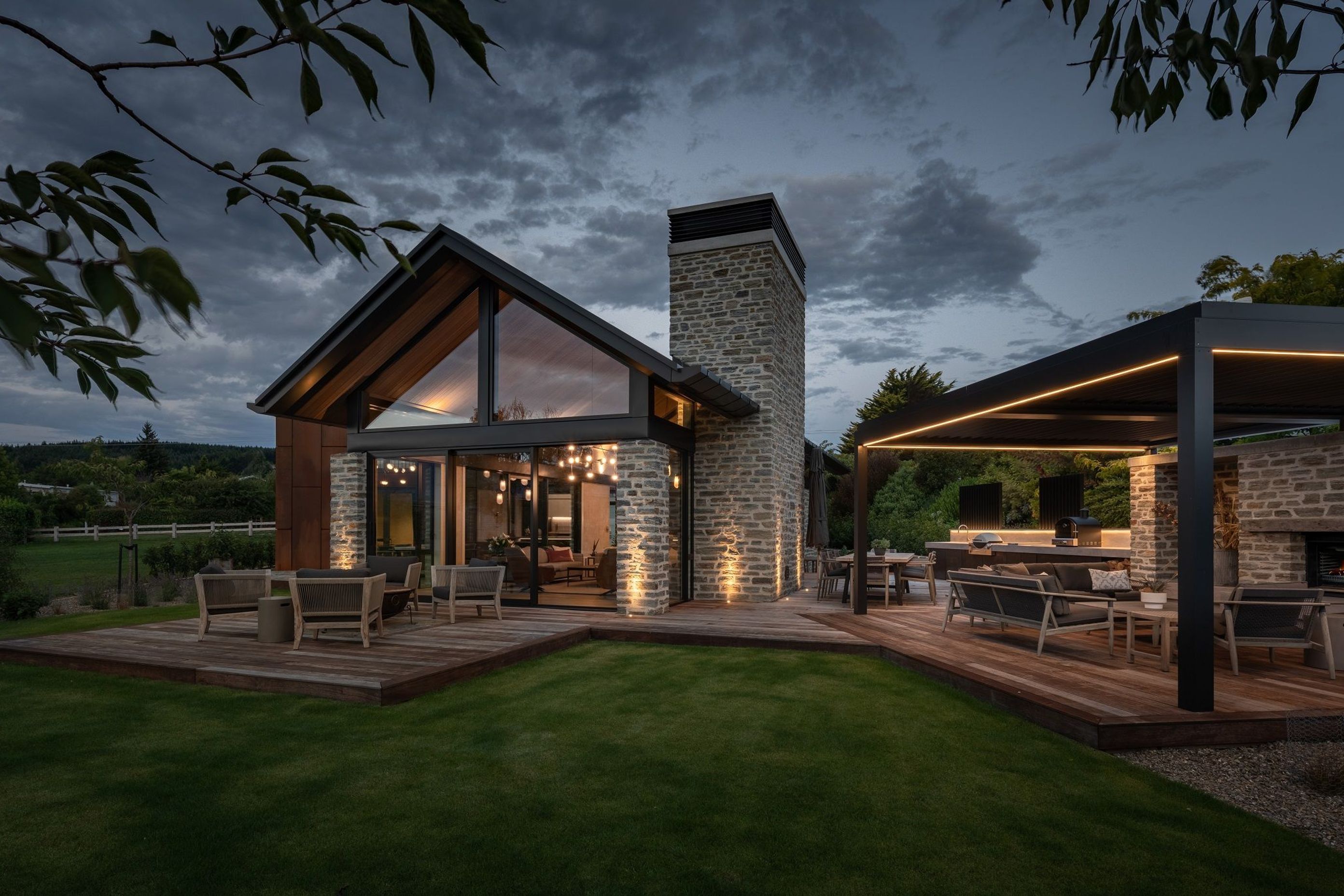 The stone cladding traditional to the area is echoed in the outdoor pavilion.