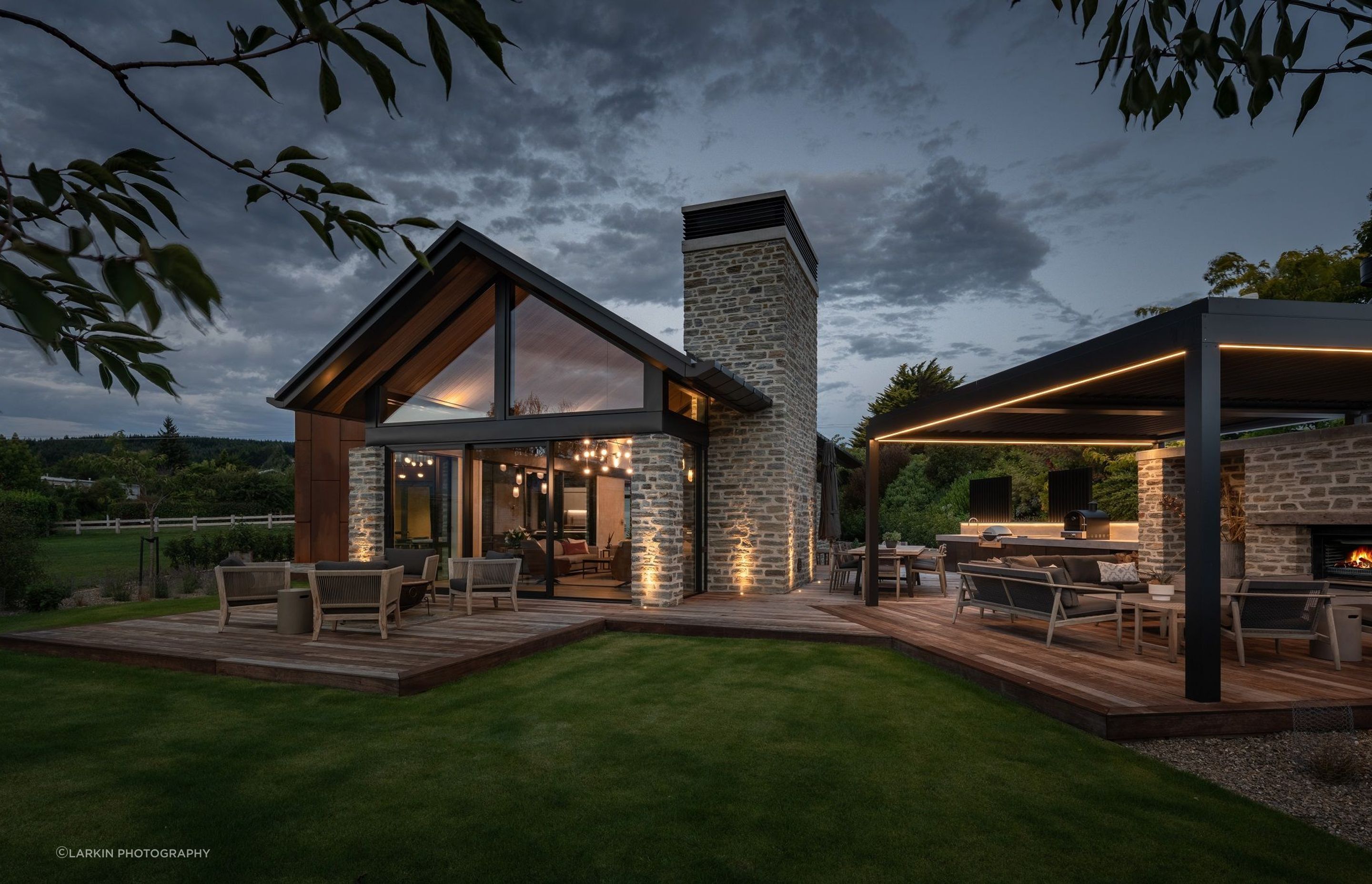 The stone cladding traditional to the area is echoed in the outdoor pavilion.