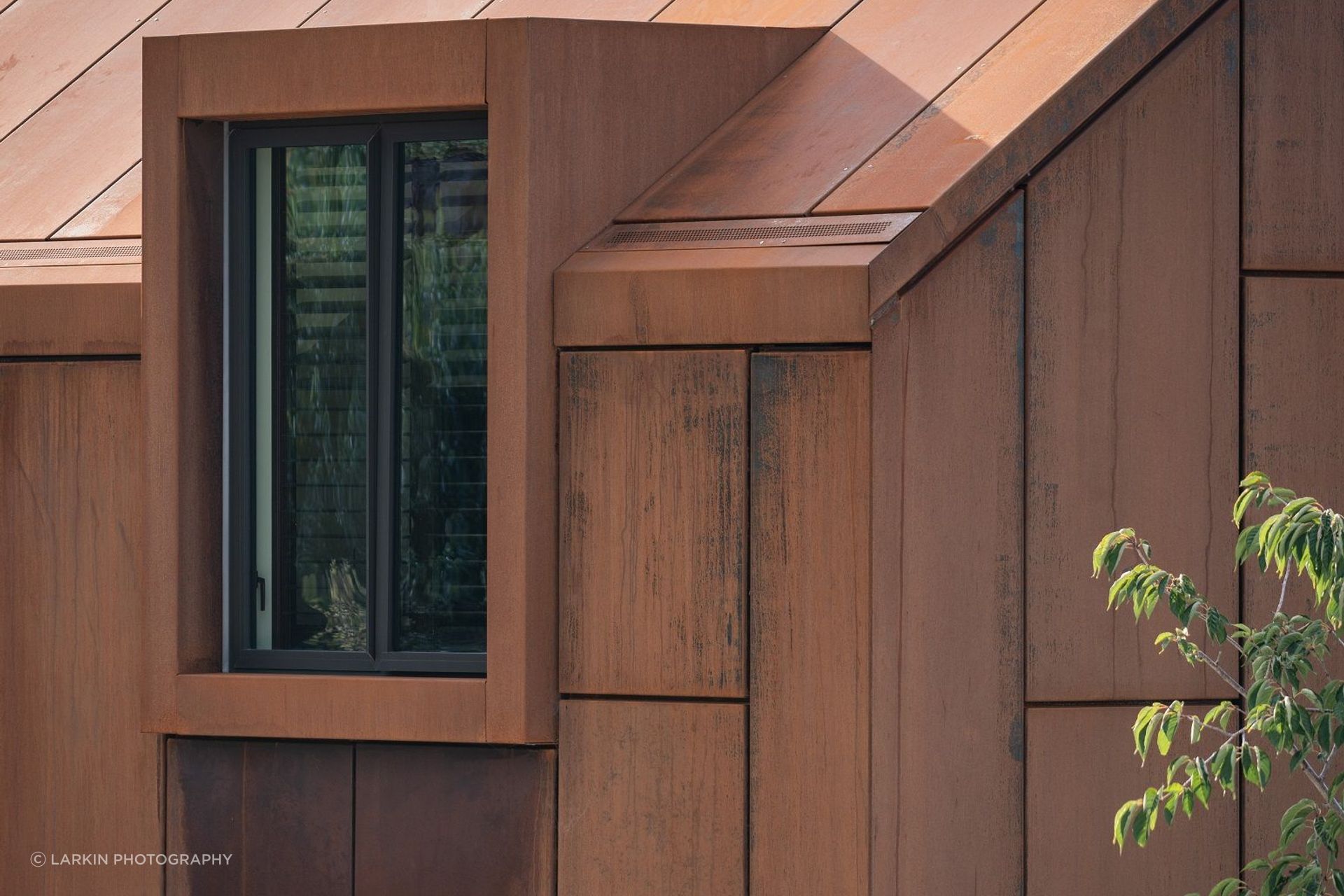 The builders had meticulous attention to detail in crafting the negative detail joins of the corten cladding.