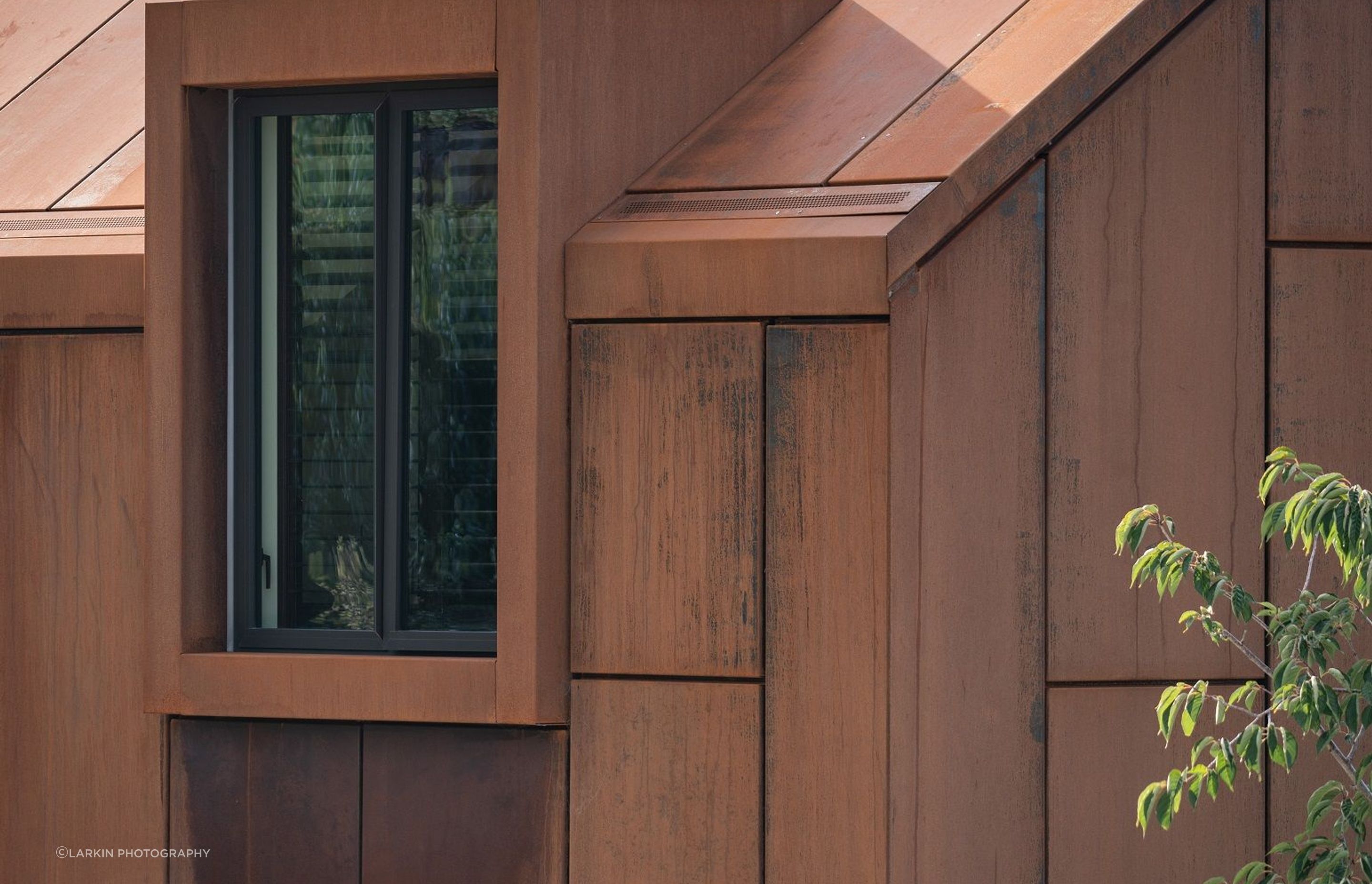 The builders had meticulous attention to detail in crafting the negative detail joins of the corten cladding.