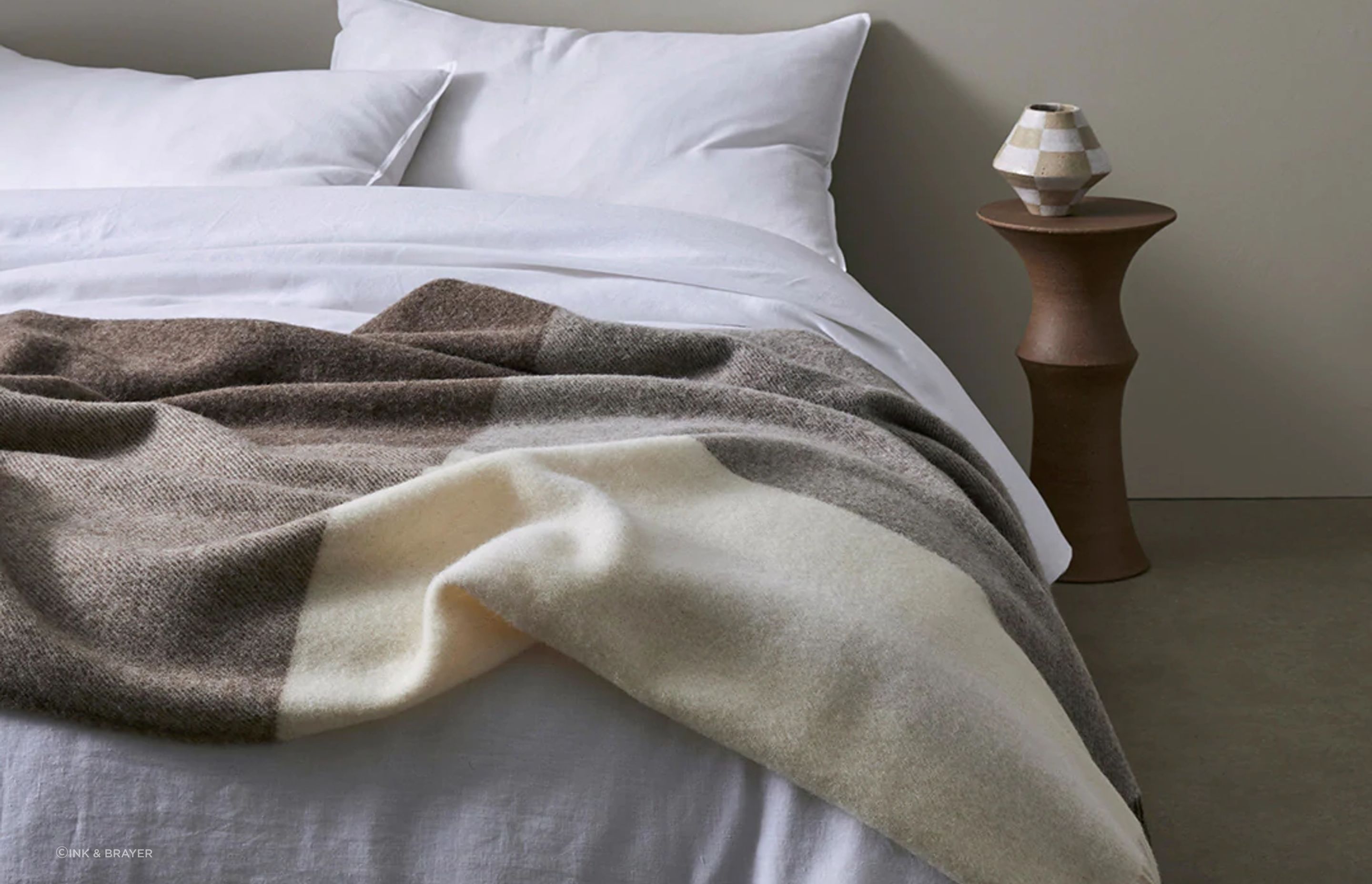 With gradient blocks of muted tones, the Weave St Bathans Wool Throw is a fantastic way to add texture and layers to your bedroom.