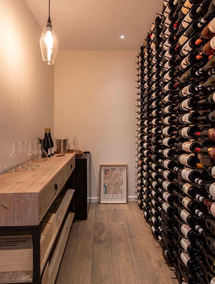 The design included a cellar to house the client's wine collection.
