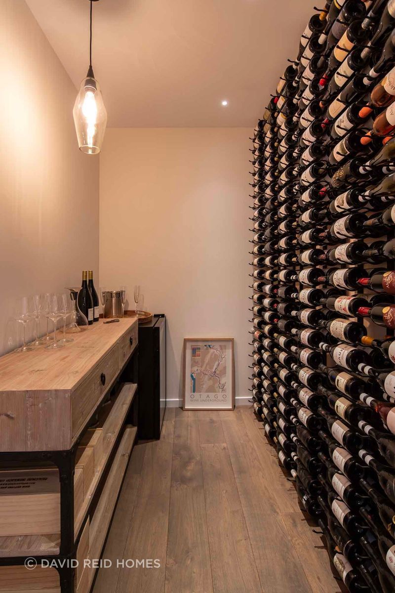 The design included a cellar to house the client's wine collection.