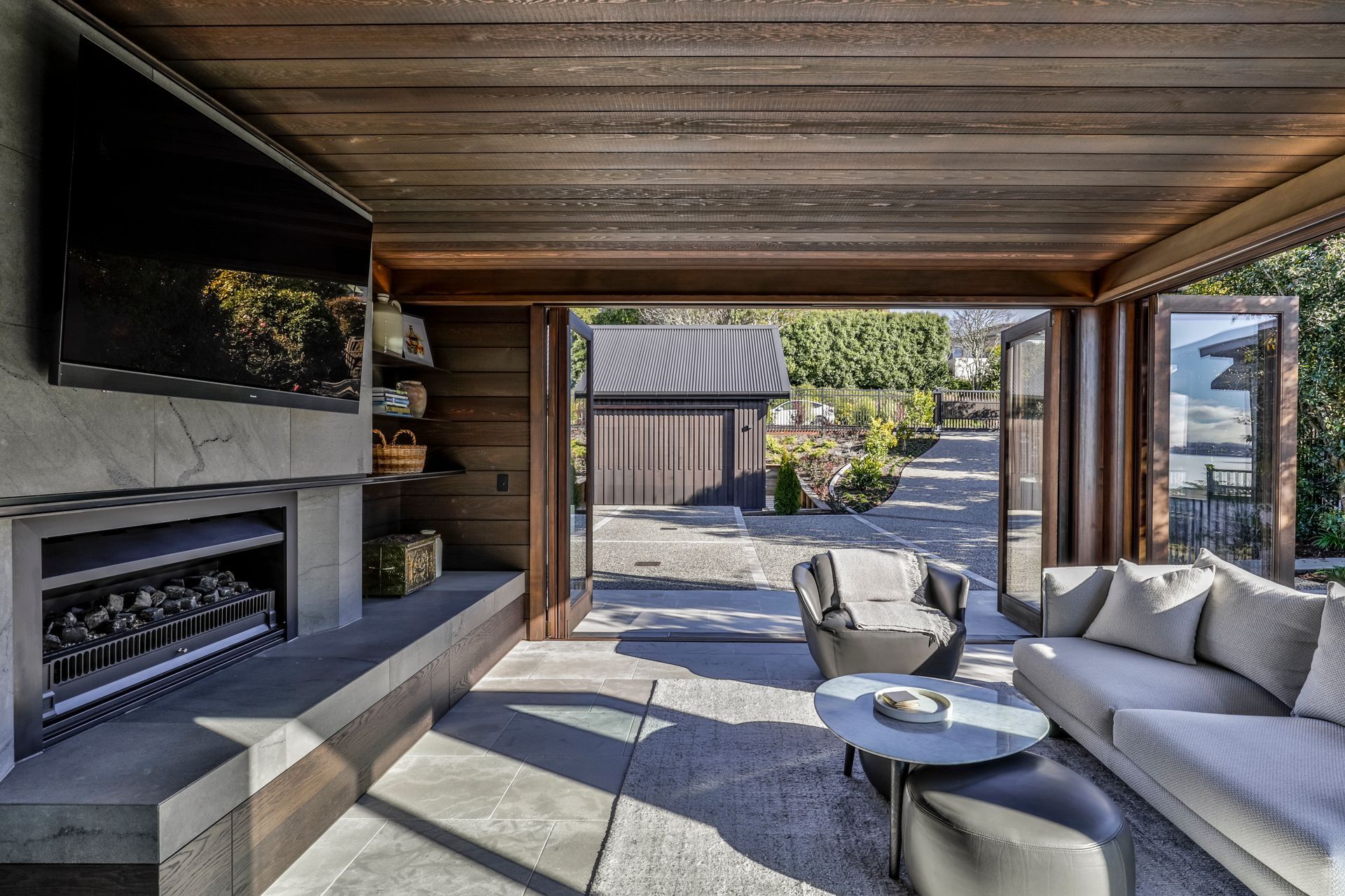Opening completely on two sides, the sunroom is a true indoor-outdoor space.