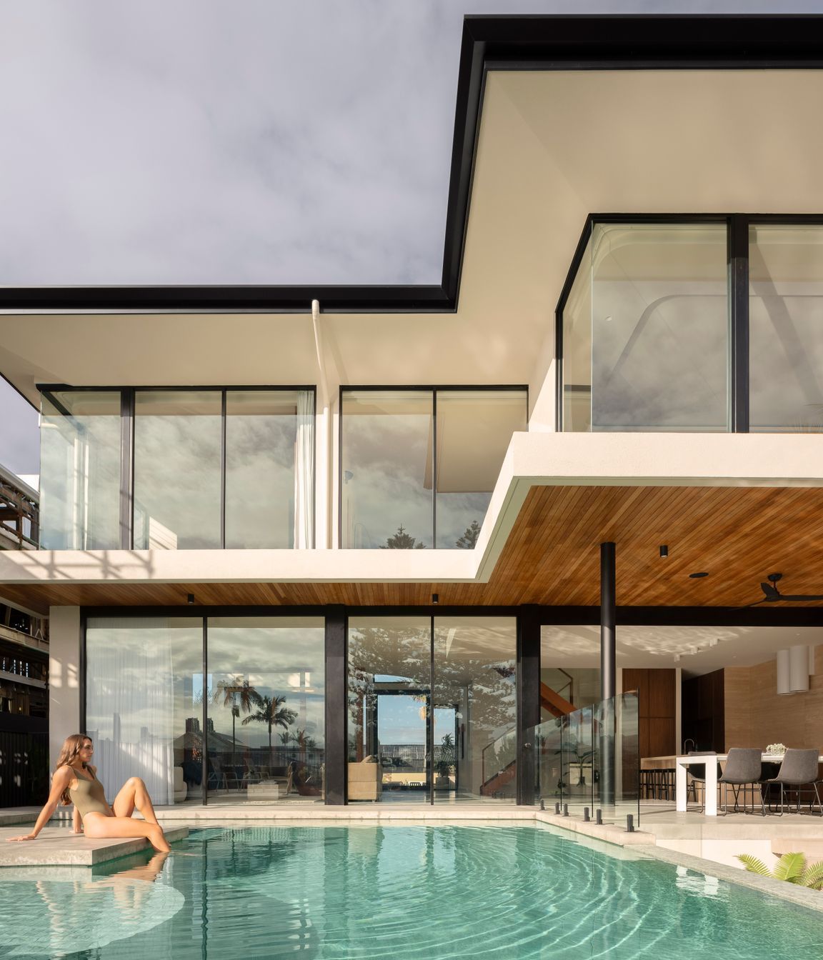 Step straight into the pool from the home's open-plan living space.