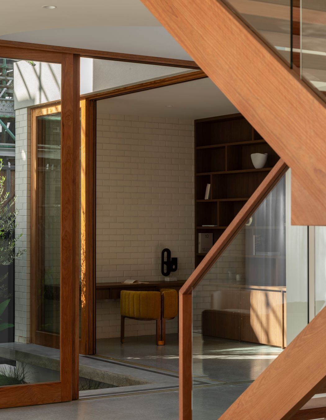 The office with the atrium courtyard opening to the left.