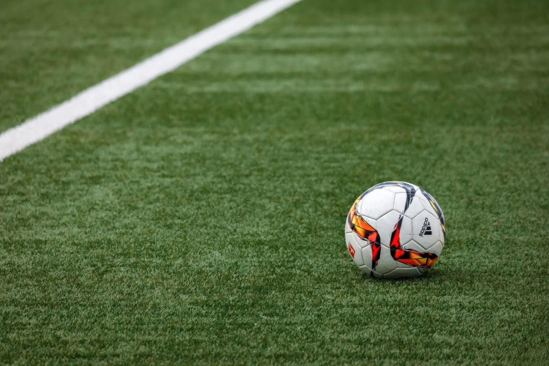 artificial-grass-on-soccer-field-scaled-gigapixel-standard-v2-2000w.jpeg