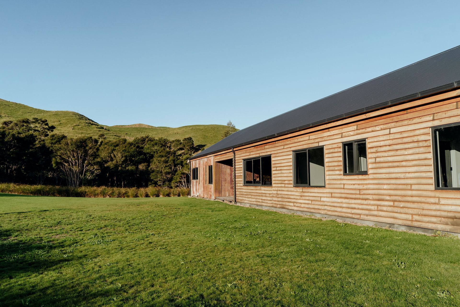 A view to the south of the house, where the recycled corrugated iron is featured.