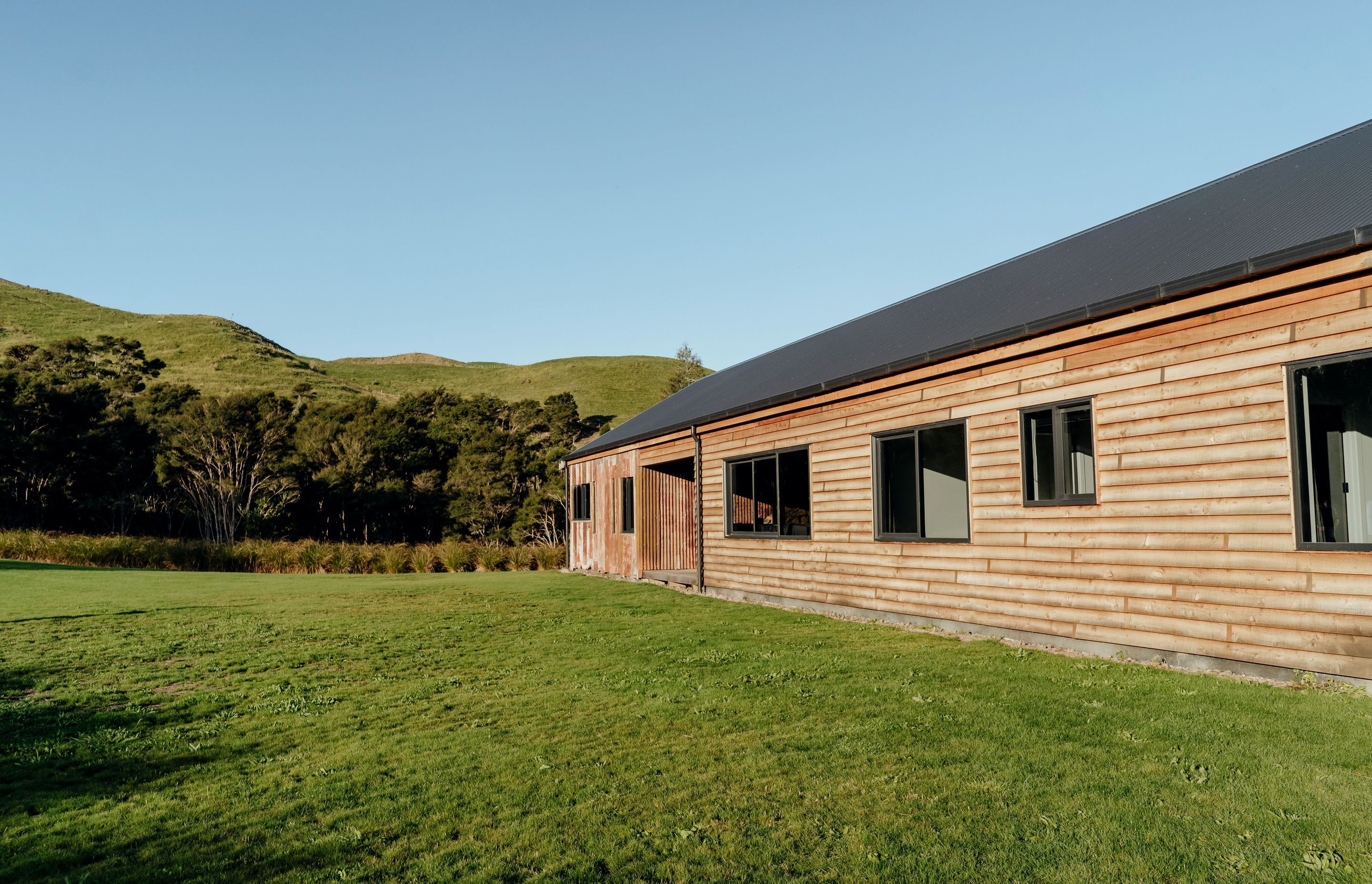 A view to the south of the house, where the recycled corrugated iron is featured.