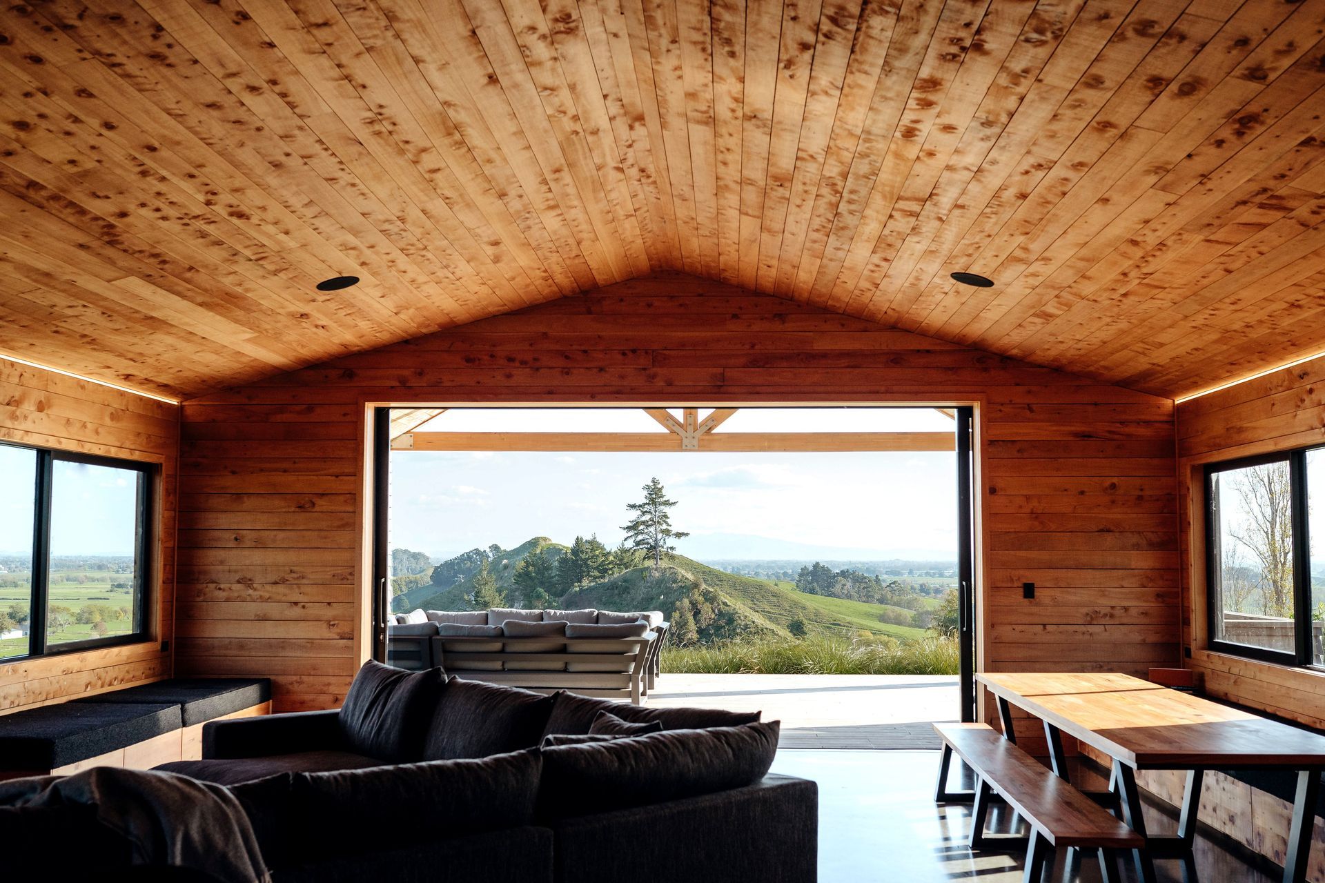 The large living area, looking out to the surrounding hills.