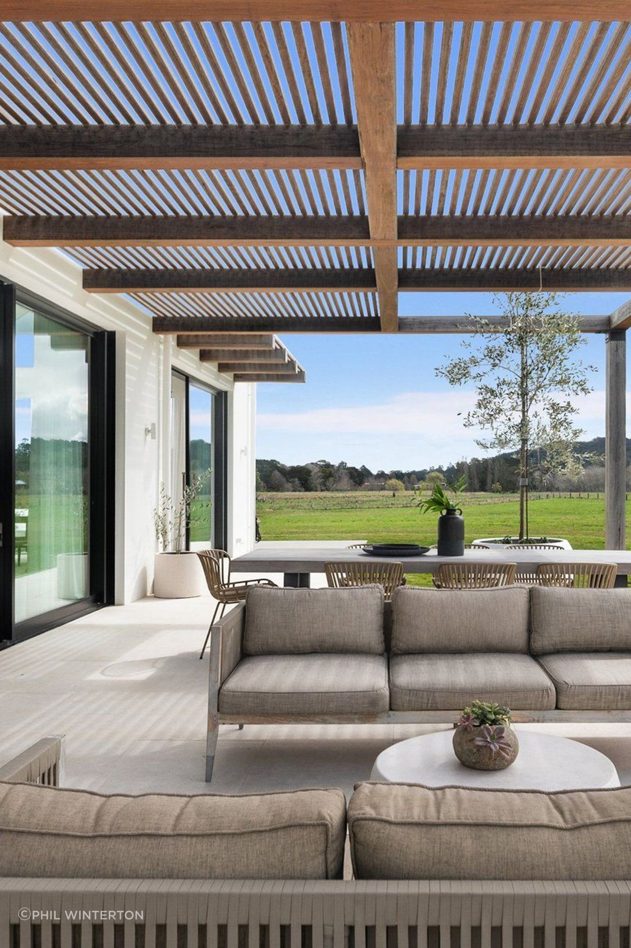Deconstructing the house with pavilions to connect with the landscape.