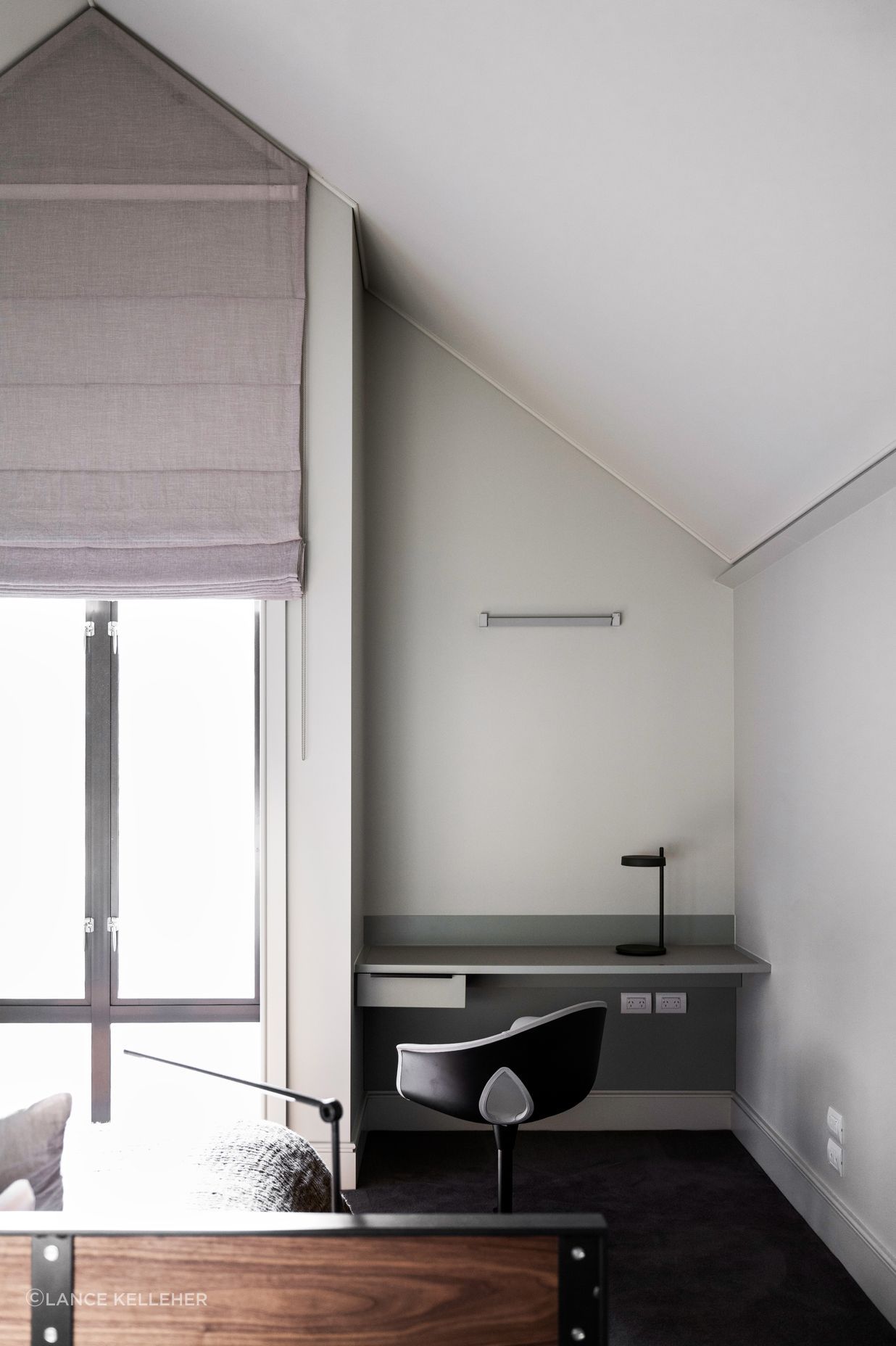 A clever office nook was created in the master bedroom.