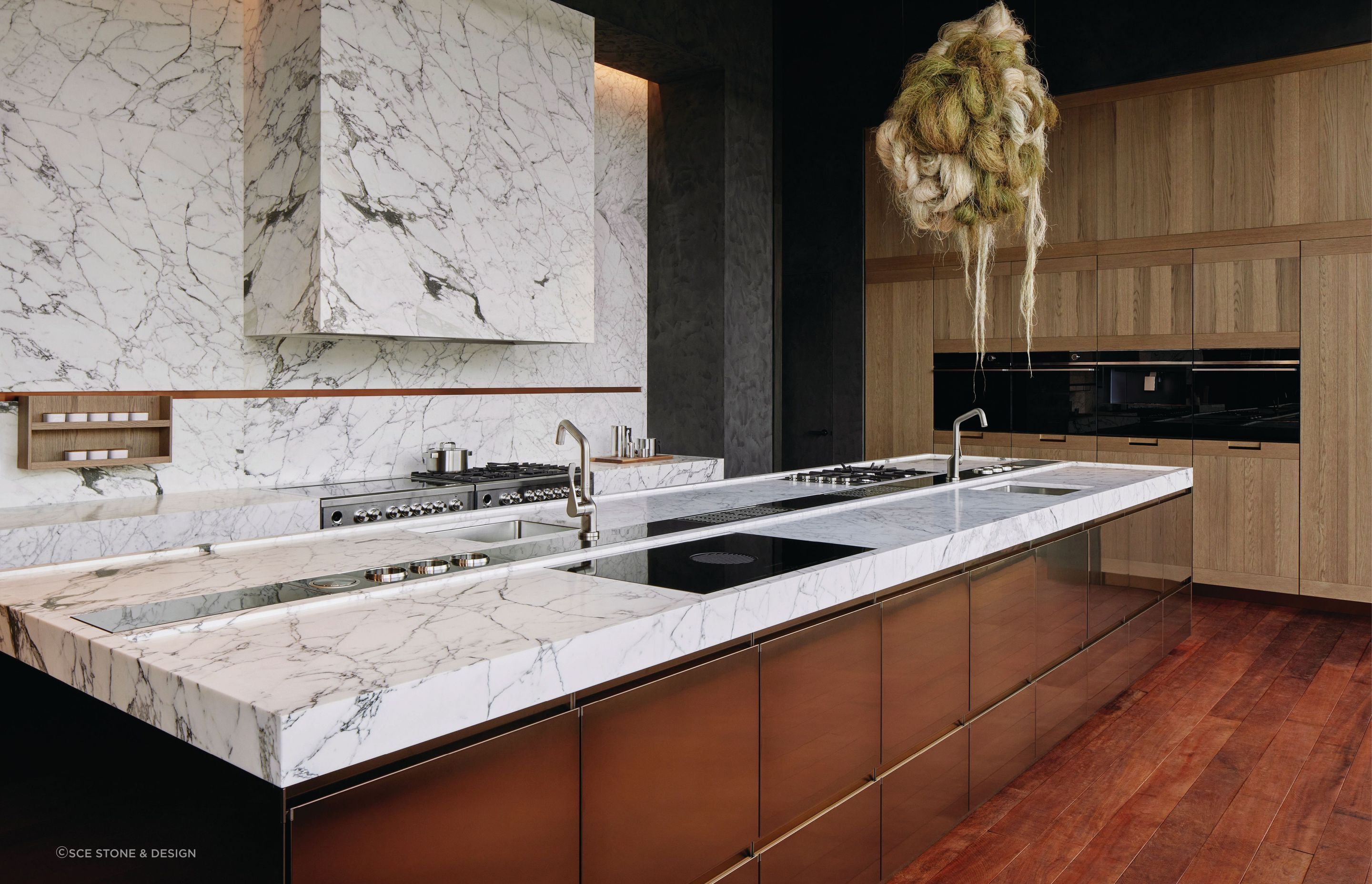 The stunning Arabescato T Marble on full display across a number of kitchen surfaces