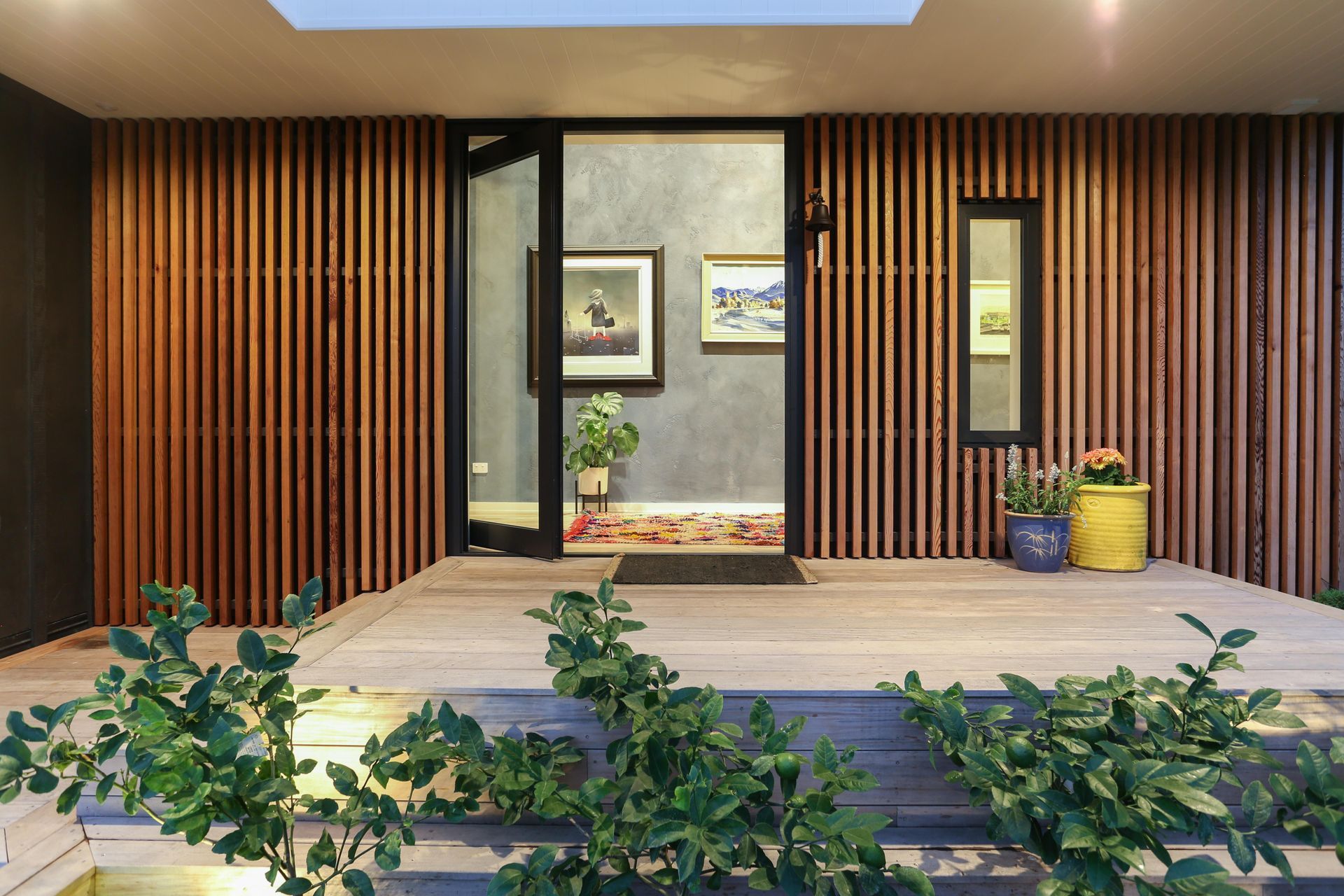 The entryway and living areas are clad in Venetian plaster.