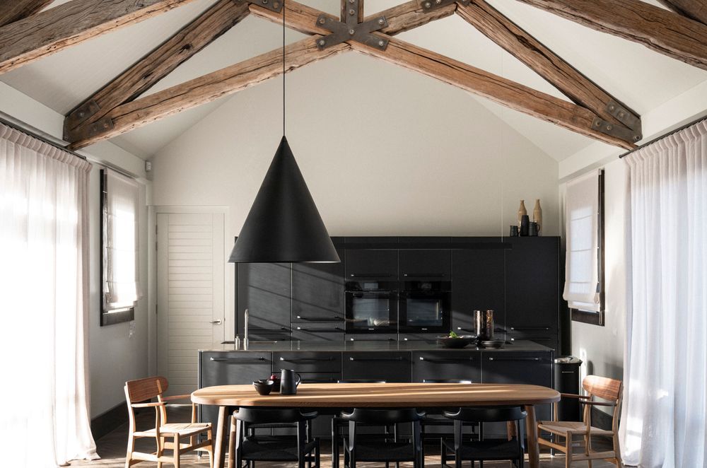 "Our approach is 'How do we heal the building?' We often feel there's something in it that needs to be removed to take it back to what it originally wanted to be," says Anna-Carin. In this case beading and plasterboard were removed to expose the oak beams in their raw state.