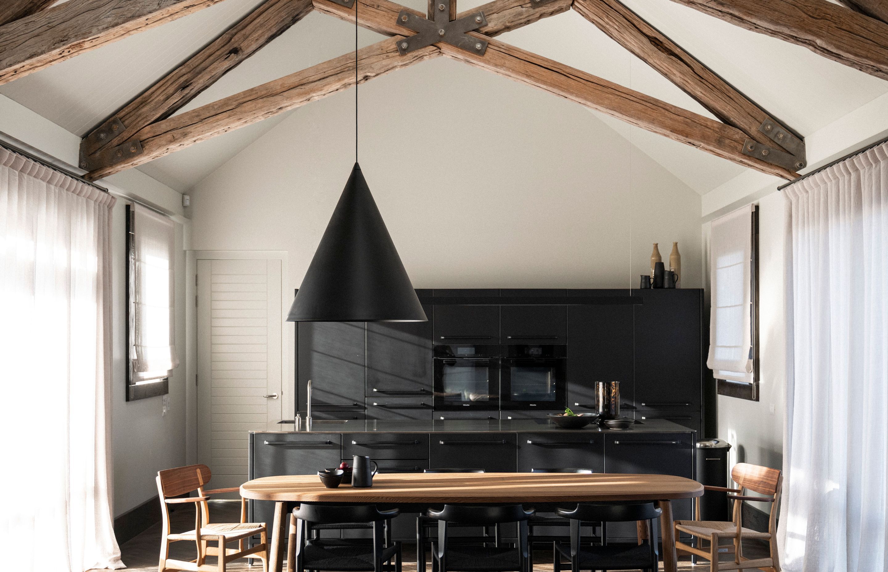 "Our approach is 'How do we heal the building?' We often feel there's something in it that needs to be removed to take it back to what it originally wanted to be," says Anna-Carin. In this case beading and plasterboard were removed to expose the oak beams in their raw state.