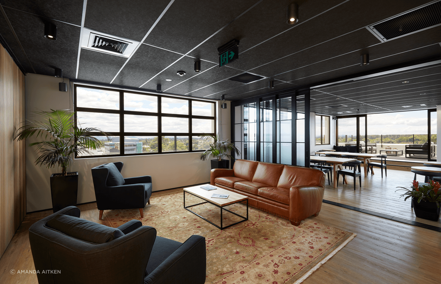 The top floor takes cues from the 1970s with joinery and room dividers that reference that era.