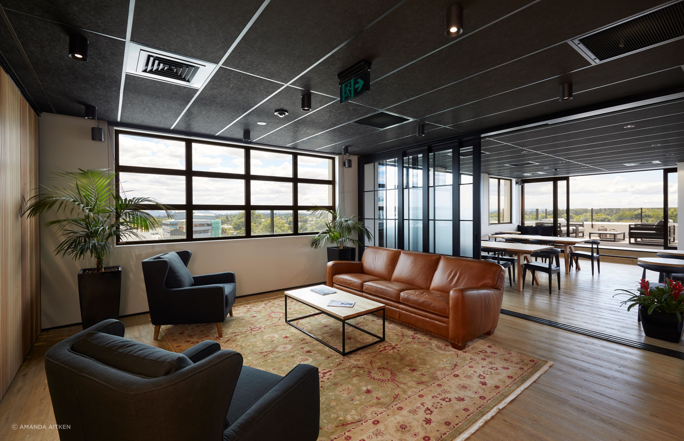 The top floor takes cues from the 1970s with joinery and room dividers that reference that era.