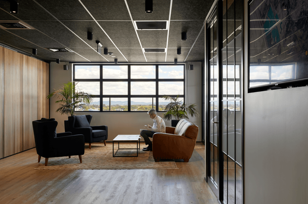 Timber elements amd plush rugs were introduced to soften the hard surfaces.