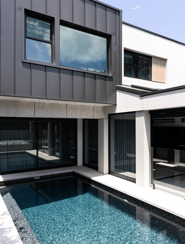 The pool is easily accessed from the indoor-outdoor entertainment area.