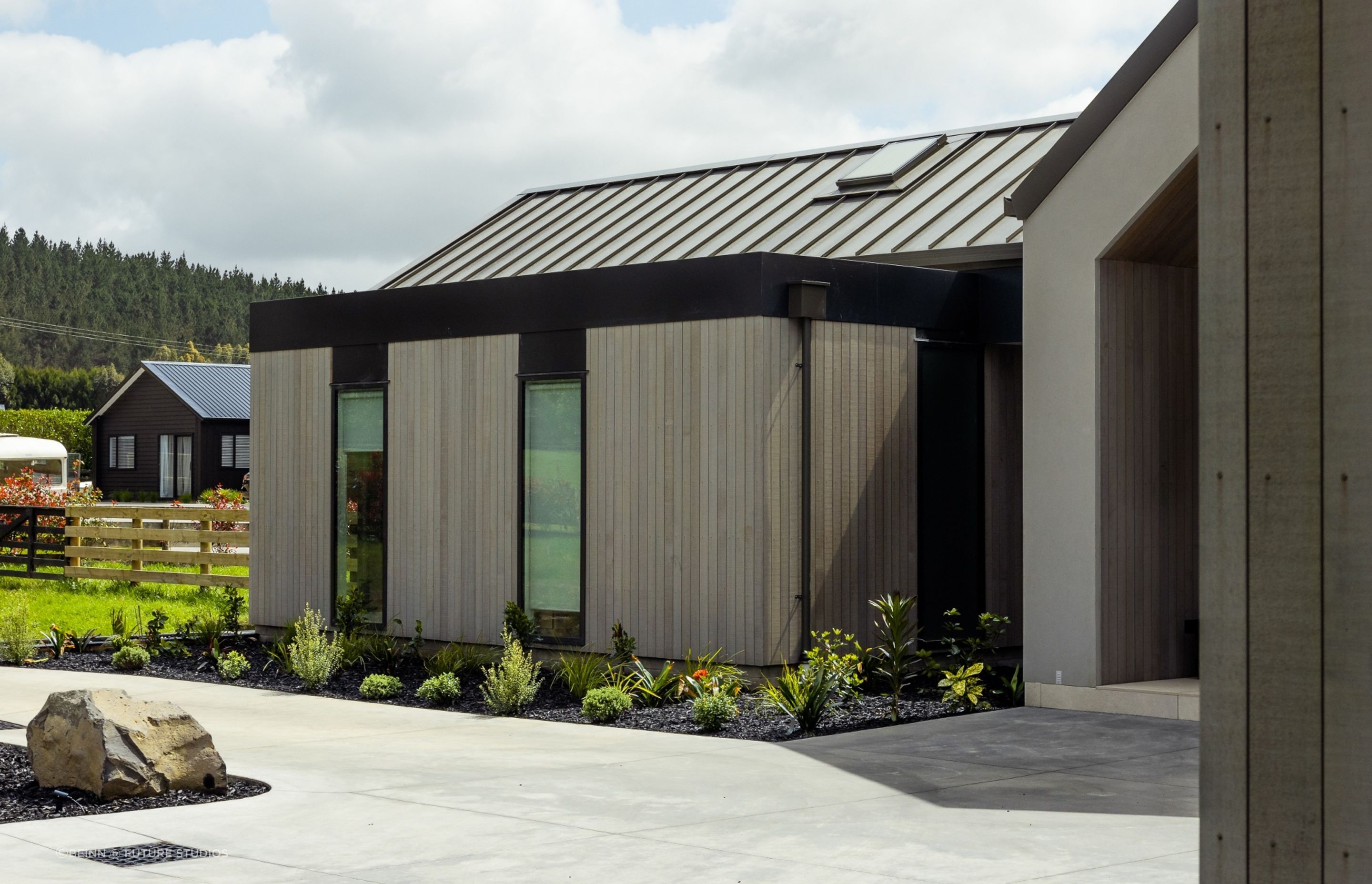 A exterior features a combination of NuWall, Espan and cedar.