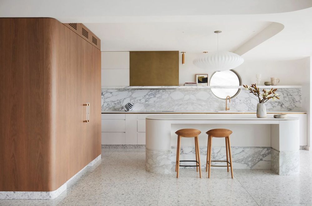 From the rounded sides of the island bench to the curves of the pantry, there's no shortage of curves in the Harbour House.